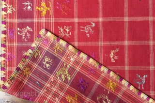 c. 1900 Sumatran Embroidered Ceremonial Food or Sireh Cover (Tutuik)

Sumatra, Minangkabau, Padang
				
Handspun cotton (base), plied silk thread (embroidery), natural (mengkudu) dye, plain weaving, satin stitch embroidery, drawnwork

An exquisite square textile made by  ...