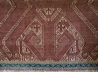 Indonesia | Antique ceremonial weaving tampan
 
Indonesia, Sumatra, Lampung, Komering, Paminggir people, c. 1900
 
Handspun cotton base, supplementary weft weaving, botanical dyes 
 
A large tampan with an imposing design executed in  ...