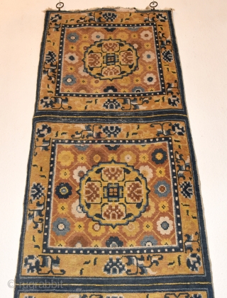 Late 19th century Ningxia Chinese meditation mat. As found. Worn fringes and ends. 197cm x 59cm/ 77x23 inches.               