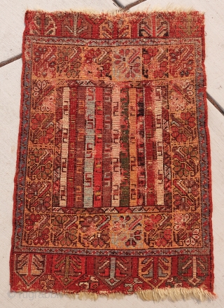 
Colorful small Kirshehir yastik with a textile inspired striped field, 1'8"x2'5"                      