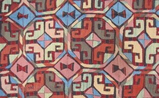 Bold wool-on-wool suzani. Kungrat Uzbek.  5'4" x 7'4" (162 x 224 cm). Densely  embroidered on a fine strip woven red and blue jajim. 1st half 20th C.  Terrific bed  ...