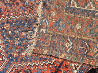 Antique Qashqai Khamseh rug in used condition. The rug has some thin patches (wear) but is still intact. The ends are open. Despite the patina, it is a beautiful bird rug with  ...