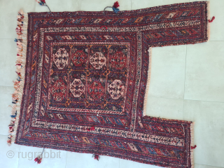 A very rare Afshar (Sirjan region) horse blanket with botehs from southern Persia. It was most certainly made for a special occasion, for personal use. Beautiful colors and woven using the Sumakh  ...