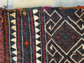 A rare and charming baby carrier from the Shavak tribe of southeastern Anatolia. Very rare, as it was only made for personal use. The last photo shows a photo by Josephine Powell  ...