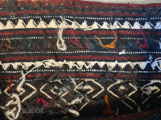 A rare and charming baby carrier from the Shavak tribe of southeastern Anatolia. Very rare, as it was only made for personal use. The last photo shows a photo by Josephine Powell  ...