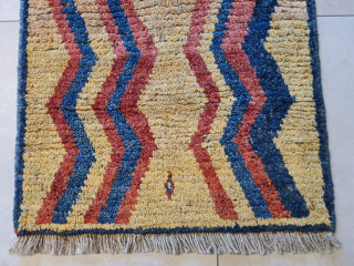 A beautiful, cute, genuine, tribal Qashqai "children" gabbeh rug with stunning natural colors. Presumably intended as a children's sleeping rug. It features a stunning asymmetrical pattern. It is in very good condition.  ...