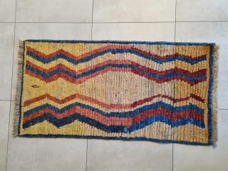 A beautiful, cute, genuine, tribal Qashqai "children" gabbeh rug with stunning natural colors. Presumably intended as a children's sleeping rug. It features a stunning asymmetrical pattern. It is in very good condition.  ...