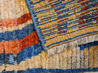 A beautiful, cute, genuine, tribal Qashqai "children" gabbeh rug with stunning natural colors. Presumably intended as a children's sleeping rug. It features a stunning asymmetrical pattern. It is in very good condition.  ...