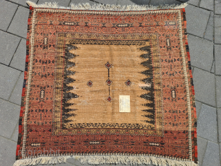 A magnificent, rare tribal Baluch sofreh kilim. The border is knotted, while the simpler center section is woven in camel. A wonderful pattern combination. With signs of wear (see photos), presumably from  ...