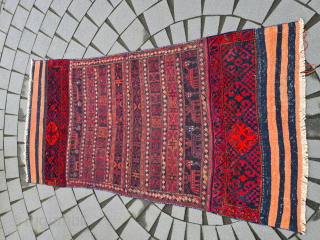 Antique opened Luri / Lori camelbag from southern Persia with rare animal and human pattern. Woven with sumakh-, lilim- and knot technique. 
Dimensions: ~ 110x220cm


Please contact me only directly: goekay.sargin@yahoo.de   