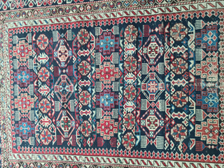 Antique Caucasian Kazak Chichi rug with beautiful natural colors. Low pile and signs of wear (see photos). The dark wool is corroded/oxidized with age. Nevertheless, a great example of its class. Dimensions:  ...