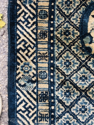 Antique Chinese rug measuring 54" * 30"
Ends missing, one small hole and small areas of wear                 