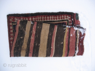  Persian Kurdish Bag in good condition. The kilim backside has some damages.  73x63 Cm. Pictures were taken in the snow. 
          