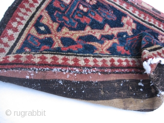  Persian Kurdish Bag in good condition. The kilim backside has some damages.  73x63 Cm. Pictures were taken in the snow. 
          