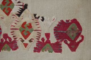 Central Anatolian Kilim Fragment. Mounted. Size of linen support (full size): 77x114cm, fragment size: about 67x104cm.                 