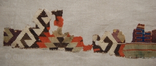 West Anatolian Kilim Fragment. Mounted. Size of linen support (full size): 58x158cm, fragment size: about 48x148cm.                 