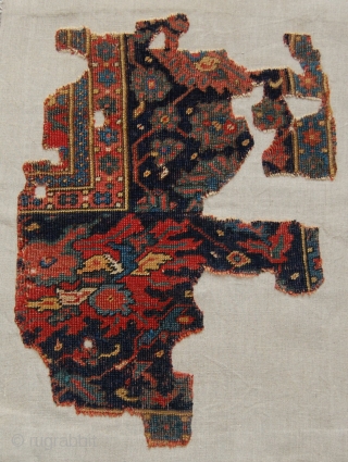 Ushak Rug - Border Fragment. Circa 16th century.  Mounted. Size of linen support (full size): 56x74cm, fragment size: about 46x64cm. Ushak rugs with this border design in the Museum of Turkish  ...