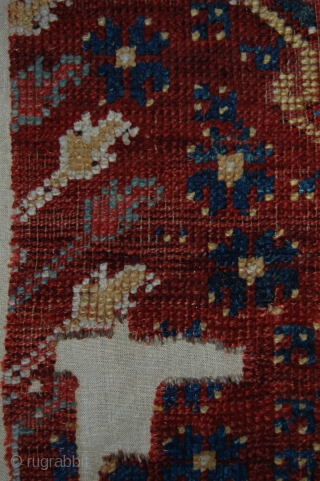 West Anatolian Ushak Rug Fragment. Mounted. Size of linen support (full size): 76x90cm, fragment size: about 66x80cm.                