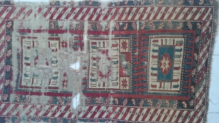 Caucasian Rug in fragmentary condition. Size: 73x129cm.                          
