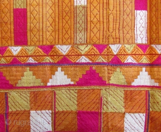 This Punjab Bagh phulkari measures 50 inches x 106 inches. There are 2 small areas where the magenta dye has bled onto a neighboring area where the cloth was folded. The overall  ...
