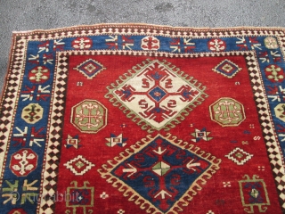 Antique Caucasian Kazak.

size 5'x7'10'' . condition very good for the age ,low pile very smalls re pile. wool on wool foundation. ends and sides intact..circa 1900.good colors.      