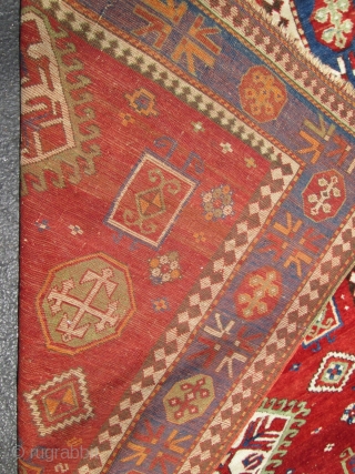 Antique Caucasian Kazak.

size 5'x7'10'' . condition very good for the age ,low pile very smalls re pile. wool on wool foundation. ends and sides intact..circa 1900.good colors.      