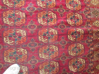 Antique Tekke Turkoman Rug.

size 11'4'' x 7'9''. condition very good for the age ,low even pile with one small spot lower then other part of the rug.  needs a bath.fine quality  ...
