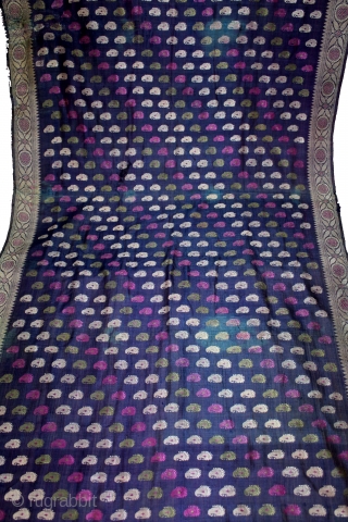 Baluchar Sari woven in silk Brocade From Murshidabad,West Bengal,India.Circa 1900.Here the pallu of the sari is decorated with large paisleys set within a border of human figures RAJA seating in his Raj-elephant.  ...