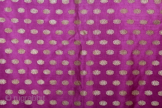 Odhni Zari Brocade(Real Silver and Gold) from Jamnagar Gujarat India..The pattern is made up of kairi,paisley, placed as a konia at the corners of the pallu.The broad plain chaudani pallu is outlined  ...