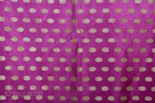 Odhni Zari Brocade(Real Silver and Gold) from Jamnagar Gujarat India..The pattern is made up of kairi,paisley, placed as a konia at the corners of the pallu.The broad plain chaudani pallu is outlined  ...
