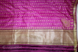 Odhni Zari Brocade(Real Silver and Gold) from Jamnagar Gujarat India..The pattern is made up of kairi,paisley, placed as a konia at the corners of the pallu.The broad plain chaudani pallu is outlined  ...