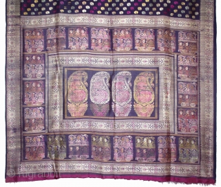 Pallav of a Baluchar Sari woven in silk Brocade From Murshidabad,West Bengal,India.The motifs of butta cones and Figures of Europeans travelling in railway carriages.British administrators were instrumental in reviving the industry there  ...