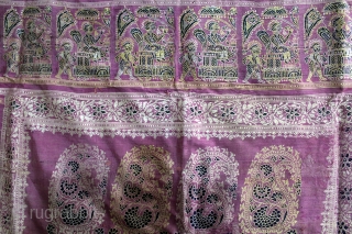 Rare Pallav of a Baluchar Sari woven in silk Brocade From Murshidabad,West Bengal,India.Circa 1900.Here the pallu of the sari is decorated with large paisleys set within a border of human figures, only  ...