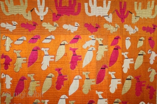 Phulkari From East(Punjab)India Known As TOTA (Parrot)with PEACOCK Bagh.C.1900.Floss Silk on Hand Spun Cotton khaddar Cloth.The pallu(Border) incorporates Human Figures leading Horses.Display of birds in a repetitive pattern across densely embroidered cloth.(DSL04000). 