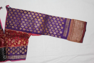 Child's(choli) from Bansali Community,kutch,Gujarat India early 20th century. Left side panel used Ambar Brocade. Right side panel used Aba Silk Fabric.(DSC01530).            