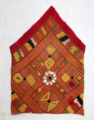 Banjara Dowry(Envelope) Bag From Karnataka,South India.C.1900.Embroidered on cotton.This is a square embroidery that has been folded and sewn to form the bag.This piece is executed in several types of stitches including, chain,  ...
