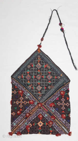 Dowry Bujki Purse From Sind Pakistan India.Circa.1930.Embroidered purse for storing or carrying bridal dowry gifts Cotton with silk embroidery,metal thread, tiny mirrors.Its size is 25cm x 38cm.(DSL04050).      