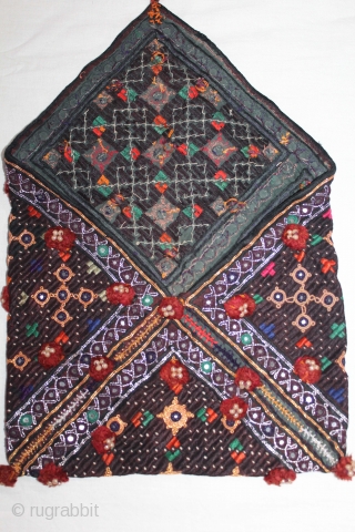 Dowry Bujki Purse From Sind Pakistan India.Circa.1930.Embroidered purse for storing or carrying bridal dowry gifts Cotton with silk embroidery,metal thread, tiny mirrors.Its size is 25cm x 38cm.(DSL04050).      