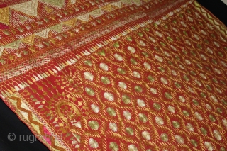 Phulkari From East(Punjab) India Called As Phulkari. Rare Surya (Sun)Design,placed as a konia at the corner of the pallu. Extremely Fine Phulkari.Its size is W-117cm X L-234cm.(DSL02680).      