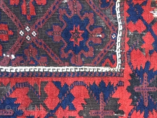 19th century Belouch rug, in distressed condition.
Stunning wool quality and good saturated colours, with non-typical design.
210cm by 104cm (7ft by 3ft 6in)           