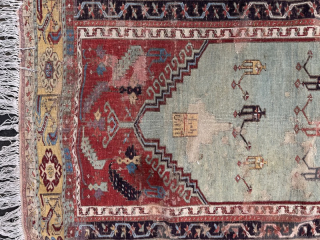 Early 19th century Ladik, in need some t.l.c. Patched, tatty, old repairs, stained, but still very charming... 1.75m by 1.20m
Contact gene@heritage-antique-rugs.com for more pics, price etc.