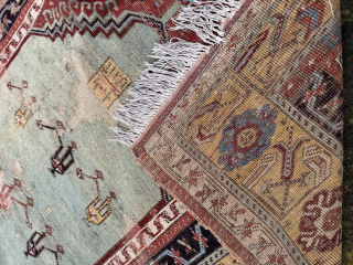 Early 19th century Ladik, in need some t.l.c. Patched, tatty, old repairs, stained, but still very charming... 1.75m by 1.20m
Contact gene@heritage-antique-rugs.com for more pics, price etc.