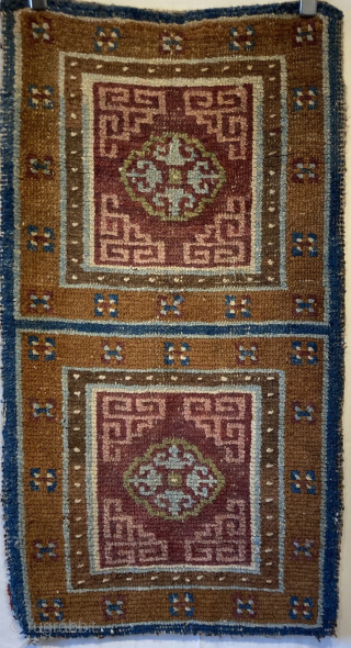 Antique Tibetan seating mat, with interesting colours
1.11m by 0.61m


Contact gene@heritage-antique-rugs.com for more pics, price etc.                  