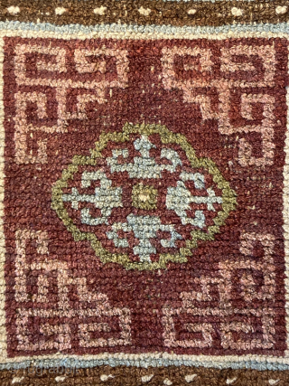 Antique Tibetan seating mat, with interesting colours
1.11m by 0.61m


Contact gene@heritage-antique-rugs.com for more pics, price etc.                  