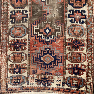 Strikingly graphic 19th century Eastern Anatolian runner, possibly Kurdish. Serious wear to the central field, some nitwit walked on it...
2.75m by 1.10m
Contact gene@heritage-antique-rugs.com for more pics, price etc.     