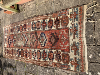 Strikingly graphic 19th century Eastern Anatolian runner, possibly Kurdish. Serious wear to the central field, some nitwit walked on it...
2.75m by 1.10m
Contact gene@heritage-antique-rugs.com for more pics, price etc.     