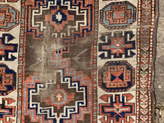 Strikingly graphic 19th century Eastern Anatolian runner, possibly Kurdish. Serious wear to the central field, some nitwit walked on it...
2.75m by 1.10m
Contact gene@heritage-antique-rugs.com for more pics, price etc.     