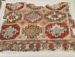 Late 18th-early 19th century Konya fragment, mounted
Strong saturated colours
58in by 52in                      