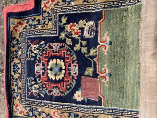 Early 20th century Tibetan saddle rug in good condition for its age.
1.29m by 0.62m
Contact gene@heritage-antique-rugs.com for more pics, price etc.             