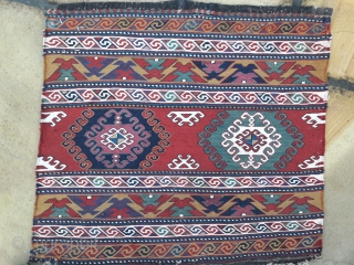 Pair of early 20th century Caucasian mafrash end panels, stunning saturated colours,
and very fine weave. Quality items, each 22in by 20in Small ares of reweave (see detail pics)     